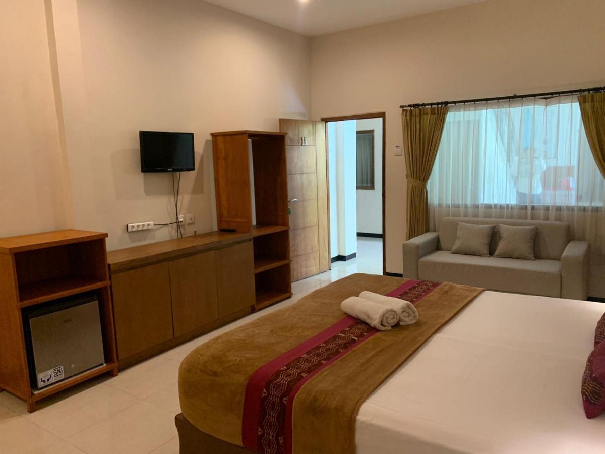 Kuta Suci Guesthouse Εξωτερικό φωτογραφία