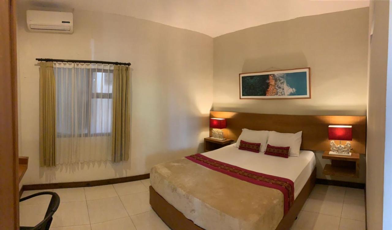 Kuta Suci Guesthouse Εξωτερικό φωτογραφία
