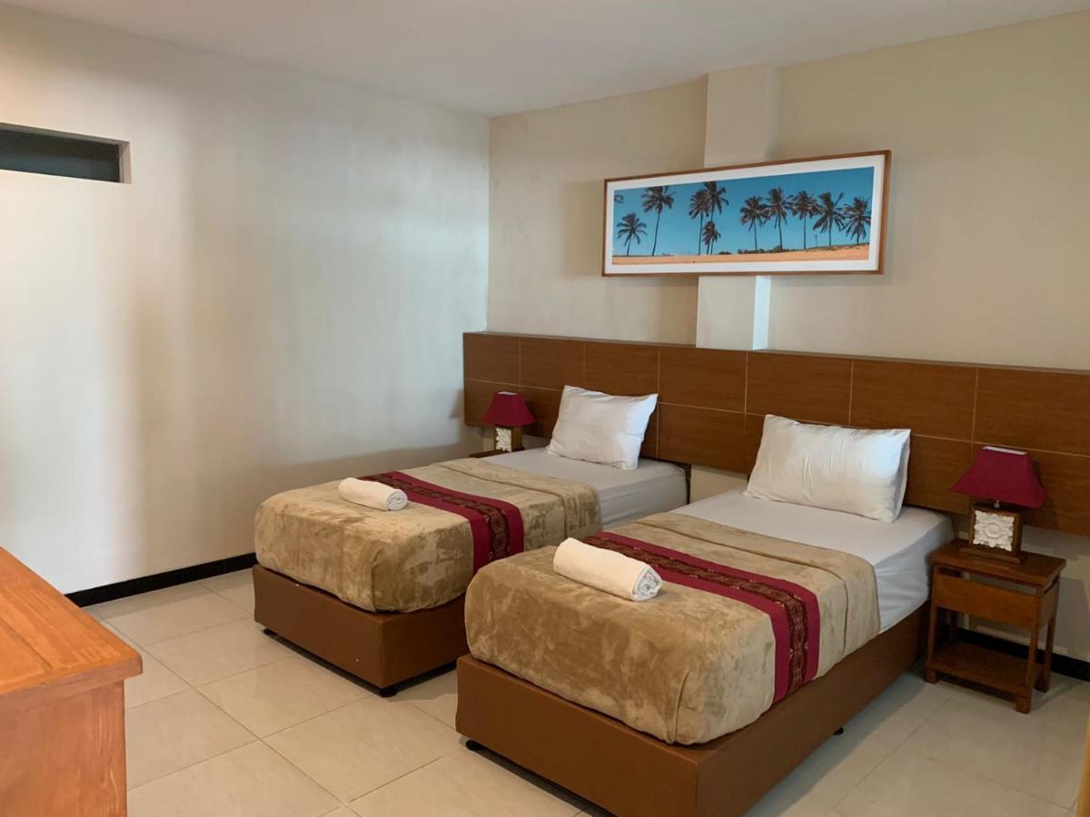 Kuta Suci Guesthouse Εξωτερικό φωτογραφία
