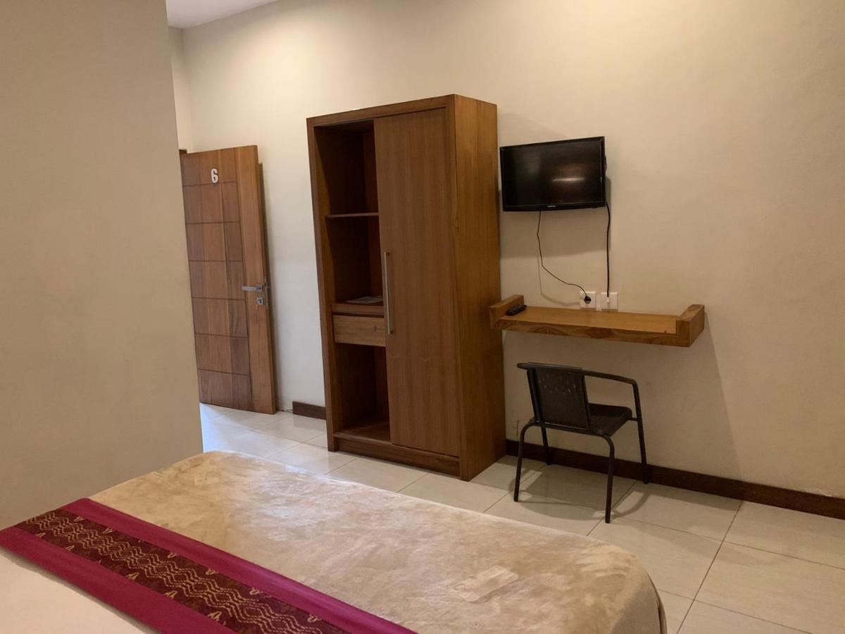Kuta Suci Guesthouse Εξωτερικό φωτογραφία