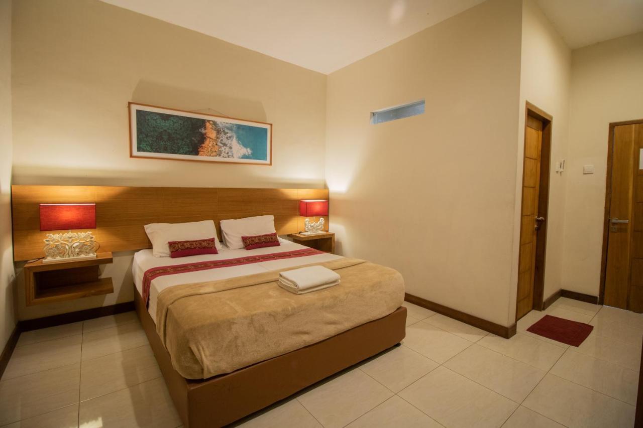 Kuta Suci Guesthouse Εξωτερικό φωτογραφία