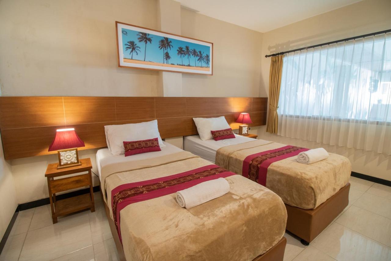 Kuta Suci Guesthouse Εξωτερικό φωτογραφία