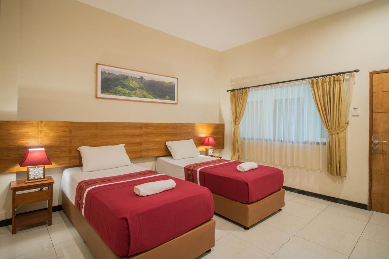 Kuta Suci Guesthouse Εξωτερικό φωτογραφία