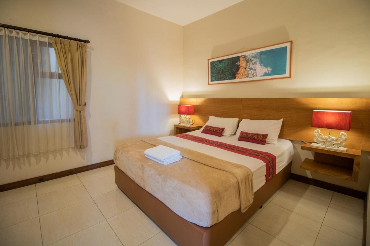Kuta Suci Guesthouse Εξωτερικό φωτογραφία