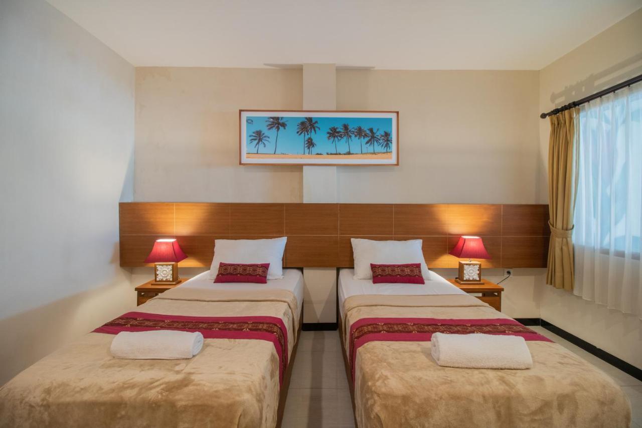 Kuta Suci Guesthouse Εξωτερικό φωτογραφία