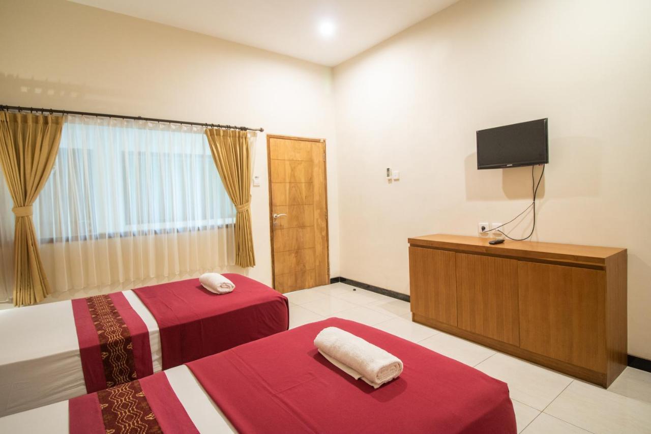 Kuta Suci Guesthouse Εξωτερικό φωτογραφία