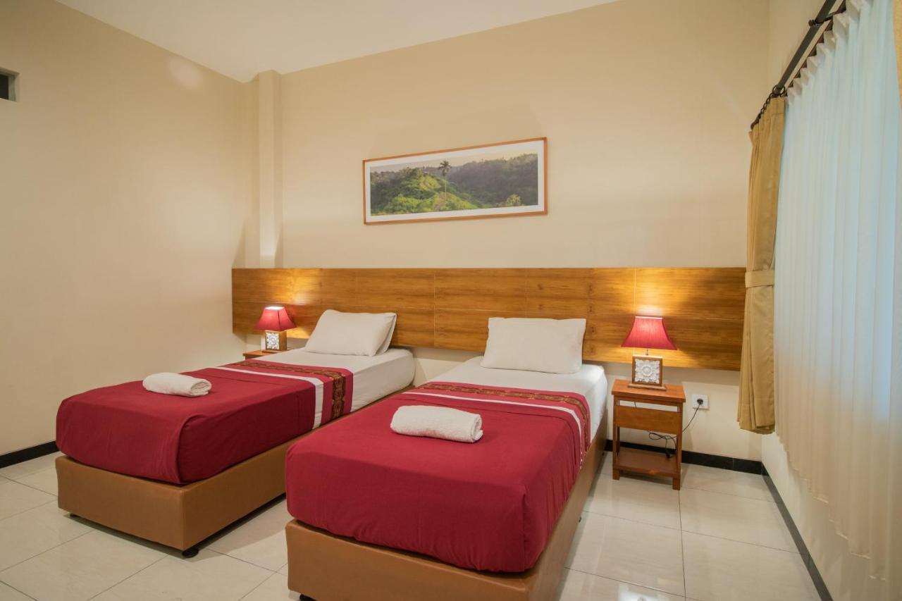 Kuta Suci Guesthouse Εξωτερικό φωτογραφία