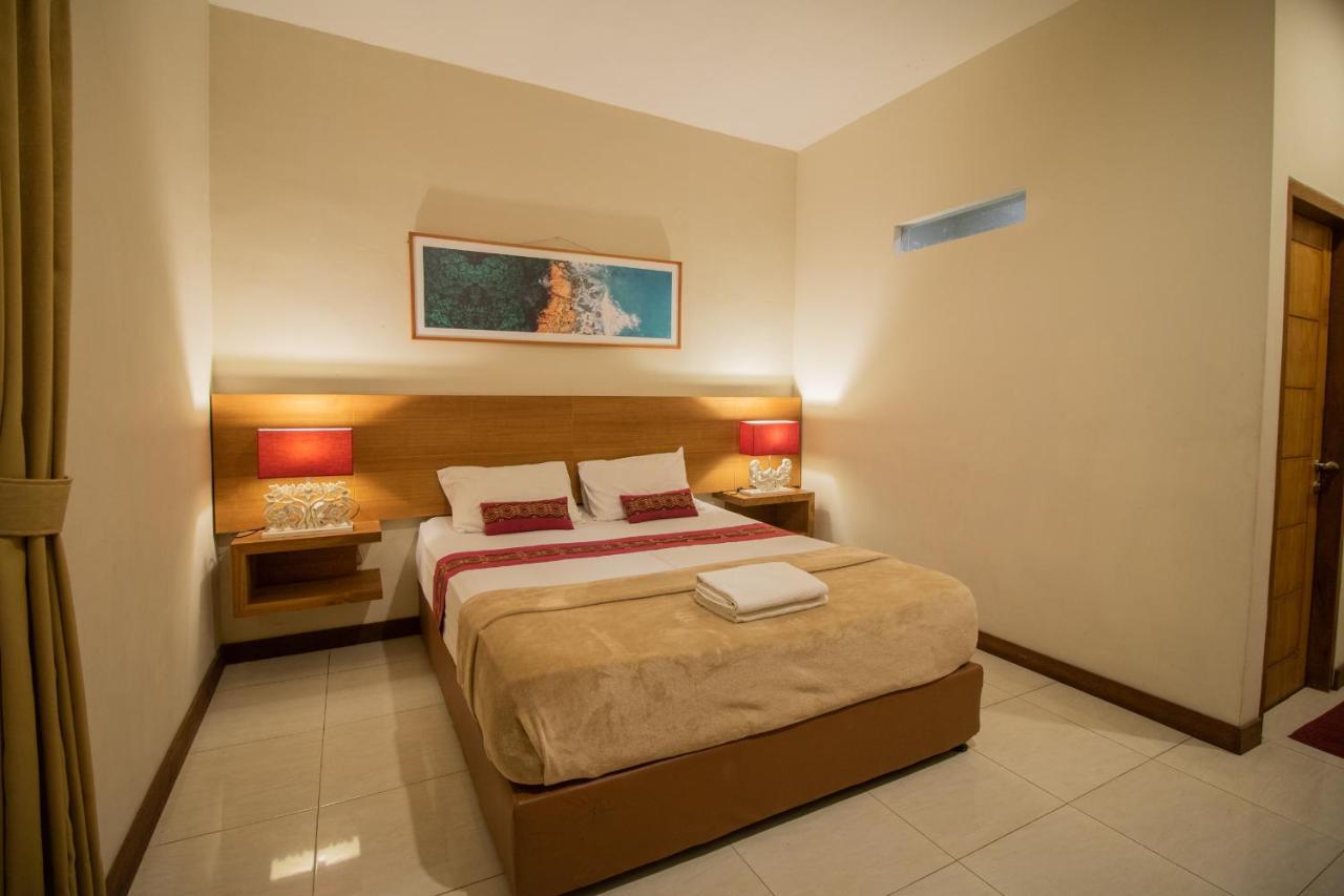 Kuta Suci Guesthouse Εξωτερικό φωτογραφία