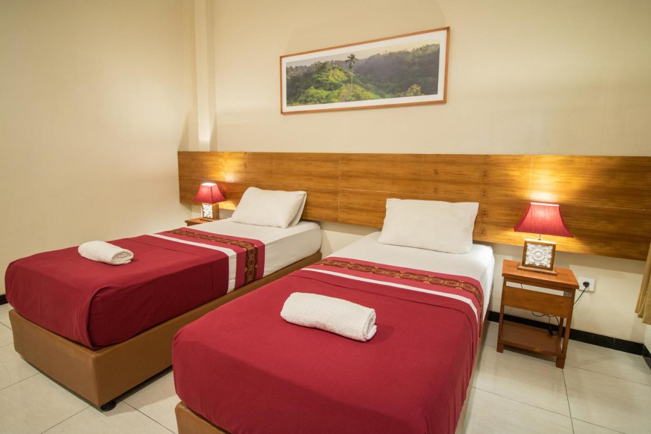 Kuta Suci Guesthouse Εξωτερικό φωτογραφία