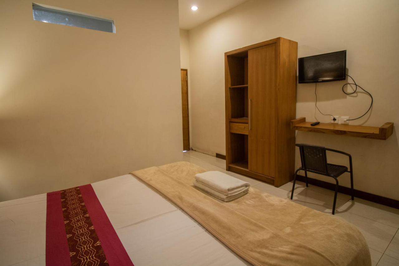 Kuta Suci Guesthouse Εξωτερικό φωτογραφία