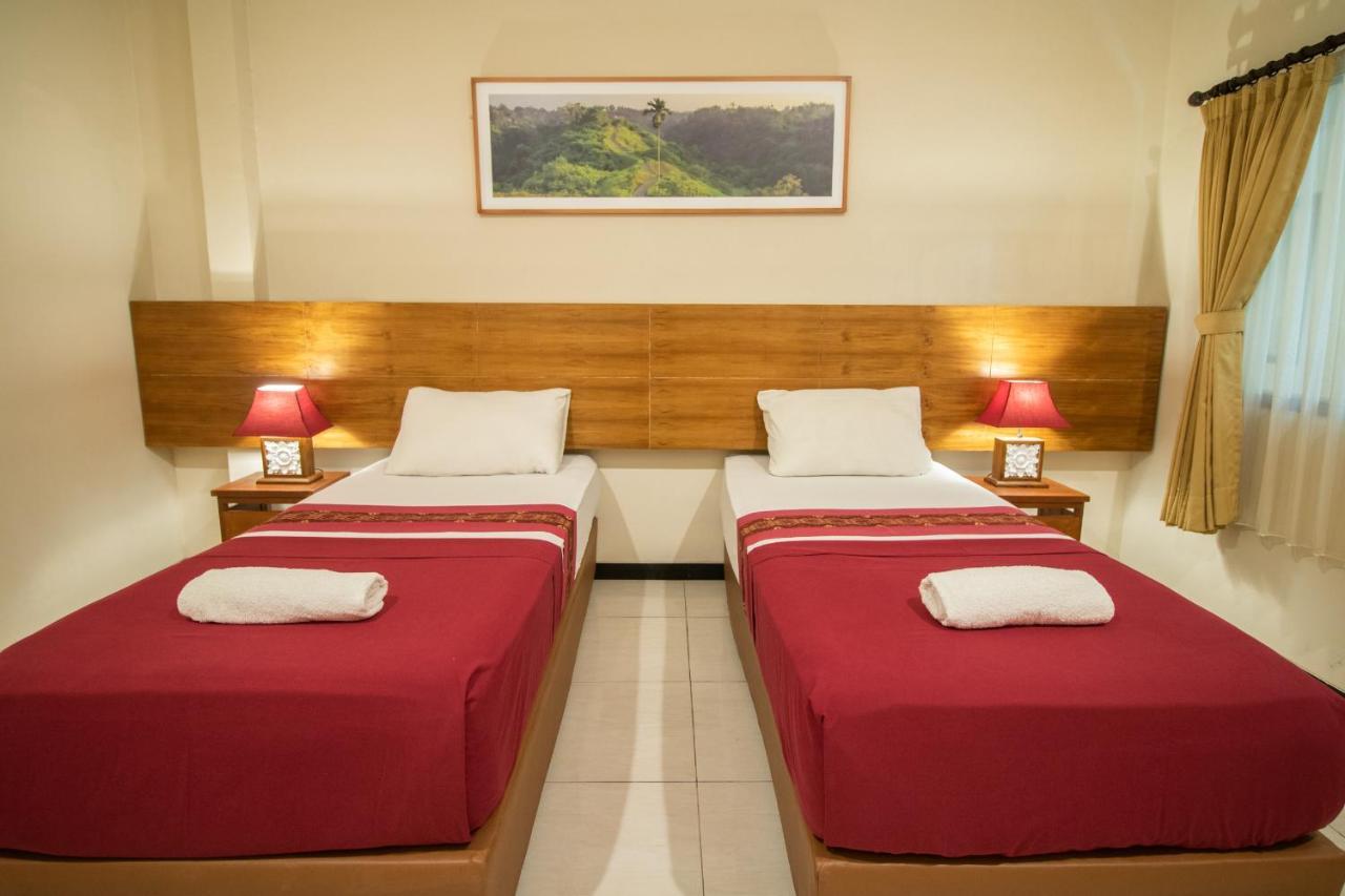Kuta Suci Guesthouse Εξωτερικό φωτογραφία