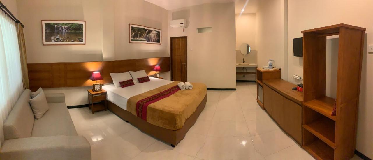 Kuta Suci Guesthouse Εξωτερικό φωτογραφία