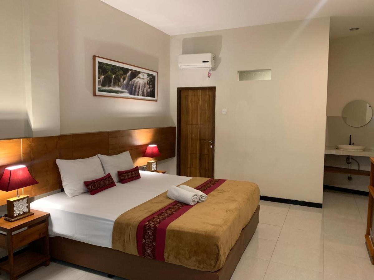 Kuta Suci Guesthouse Εξωτερικό φωτογραφία