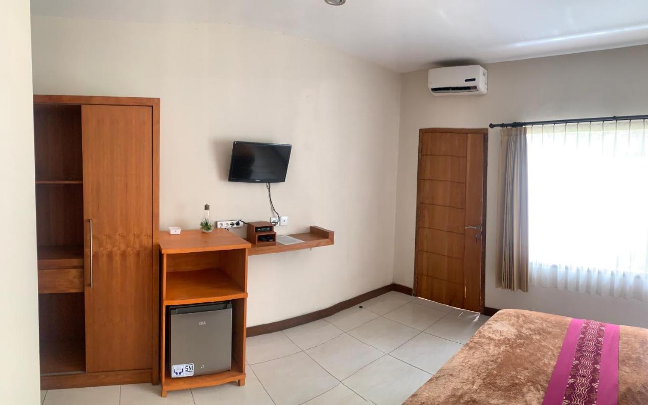 Kuta Suci Guesthouse Εξωτερικό φωτογραφία