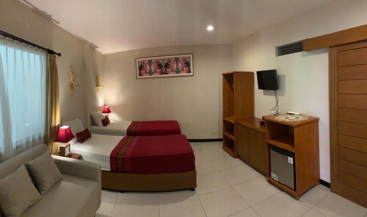 Kuta Suci Guesthouse Εξωτερικό φωτογραφία