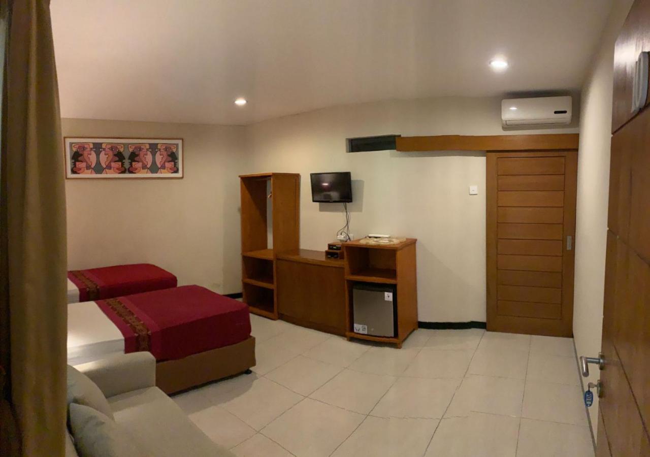 Kuta Suci Guesthouse Εξωτερικό φωτογραφία