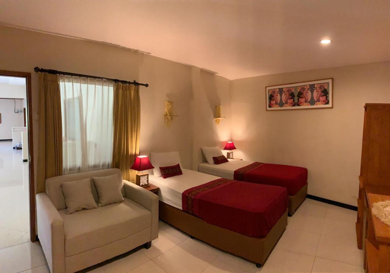 Kuta Suci Guesthouse Εξωτερικό φωτογραφία