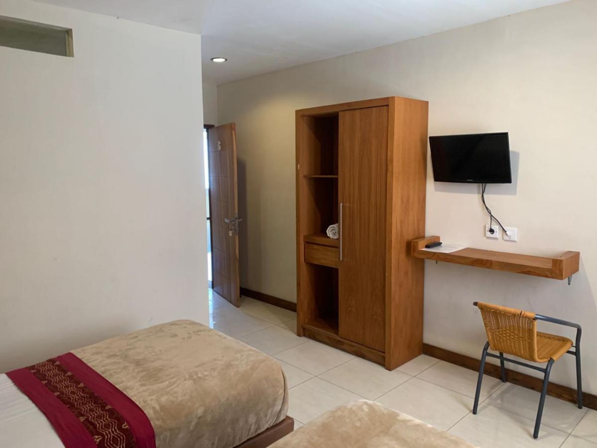 Kuta Suci Guesthouse Εξωτερικό φωτογραφία