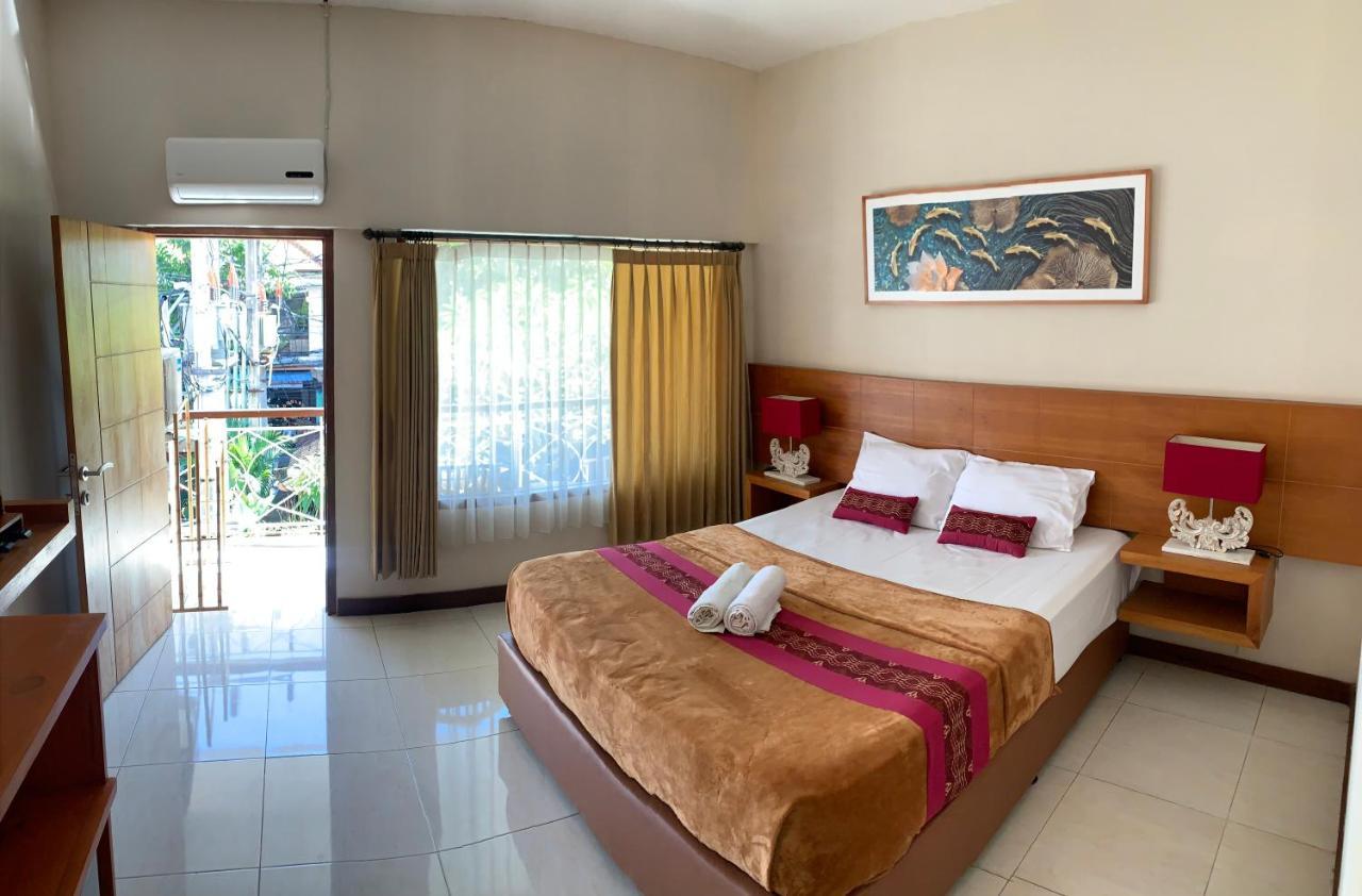 Kuta Suci Guesthouse Εξωτερικό φωτογραφία