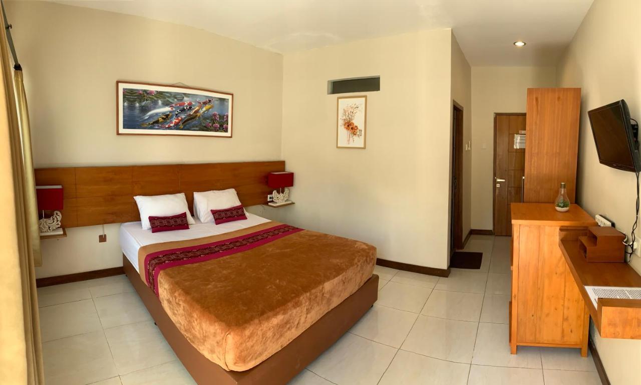Kuta Suci Guesthouse Εξωτερικό φωτογραφία
