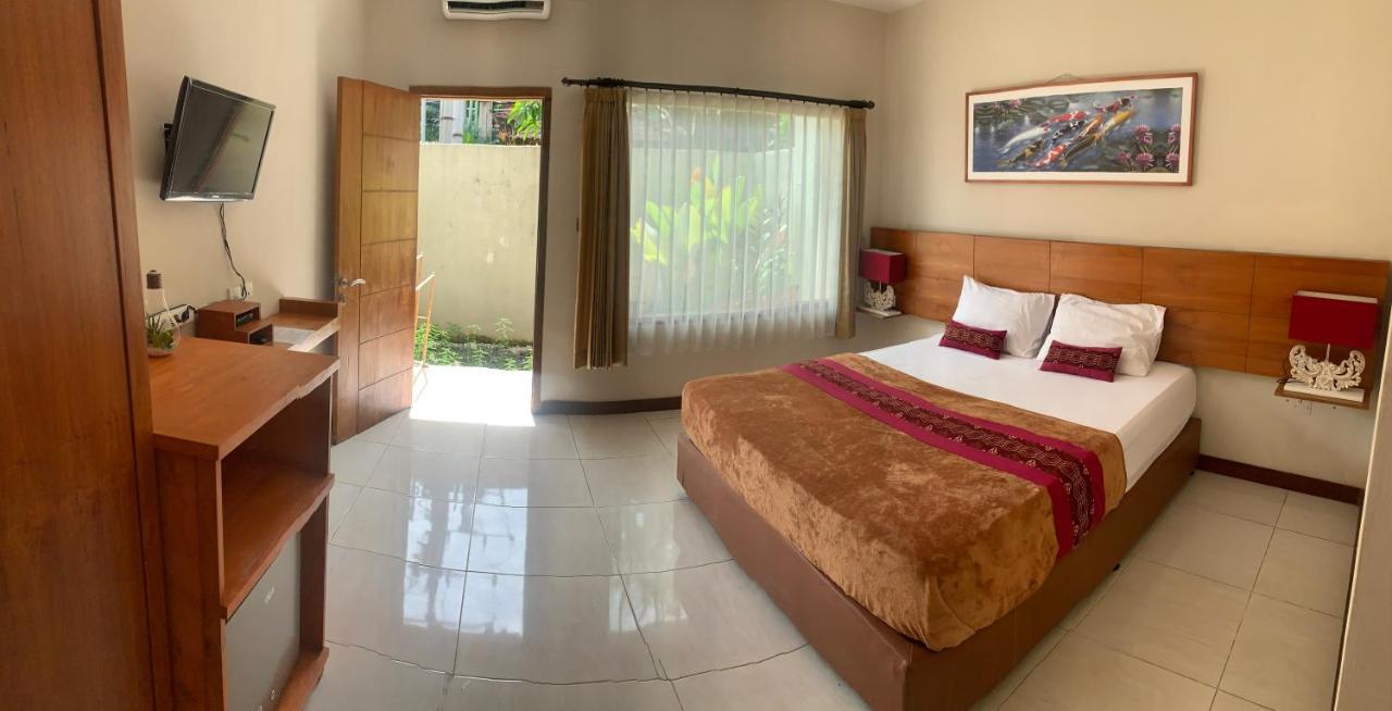 Kuta Suci Guesthouse Εξωτερικό φωτογραφία