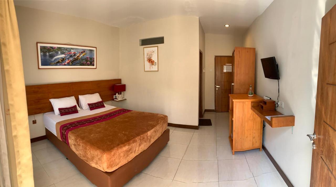 Kuta Suci Guesthouse Εξωτερικό φωτογραφία
