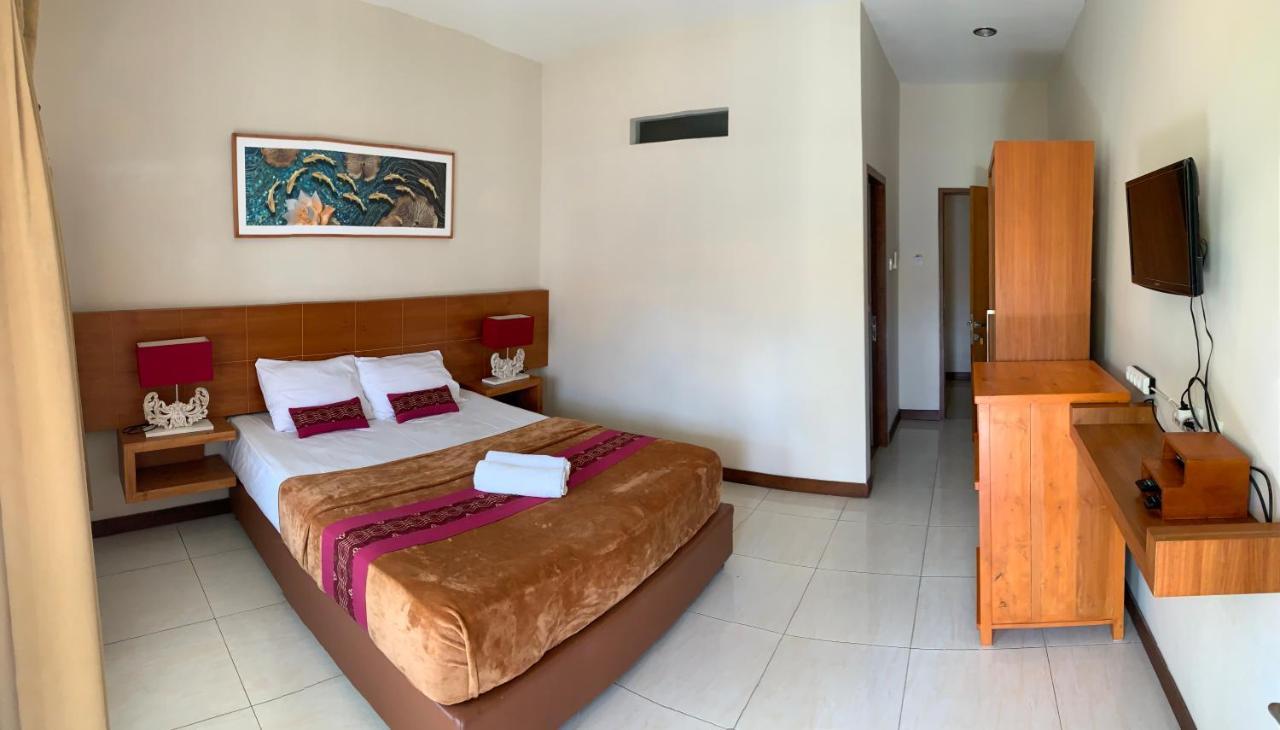 Kuta Suci Guesthouse Εξωτερικό φωτογραφία