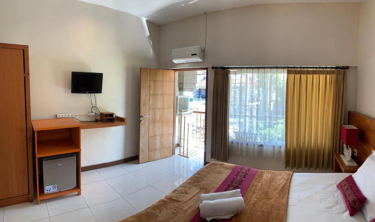 Kuta Suci Guesthouse Εξωτερικό φωτογραφία