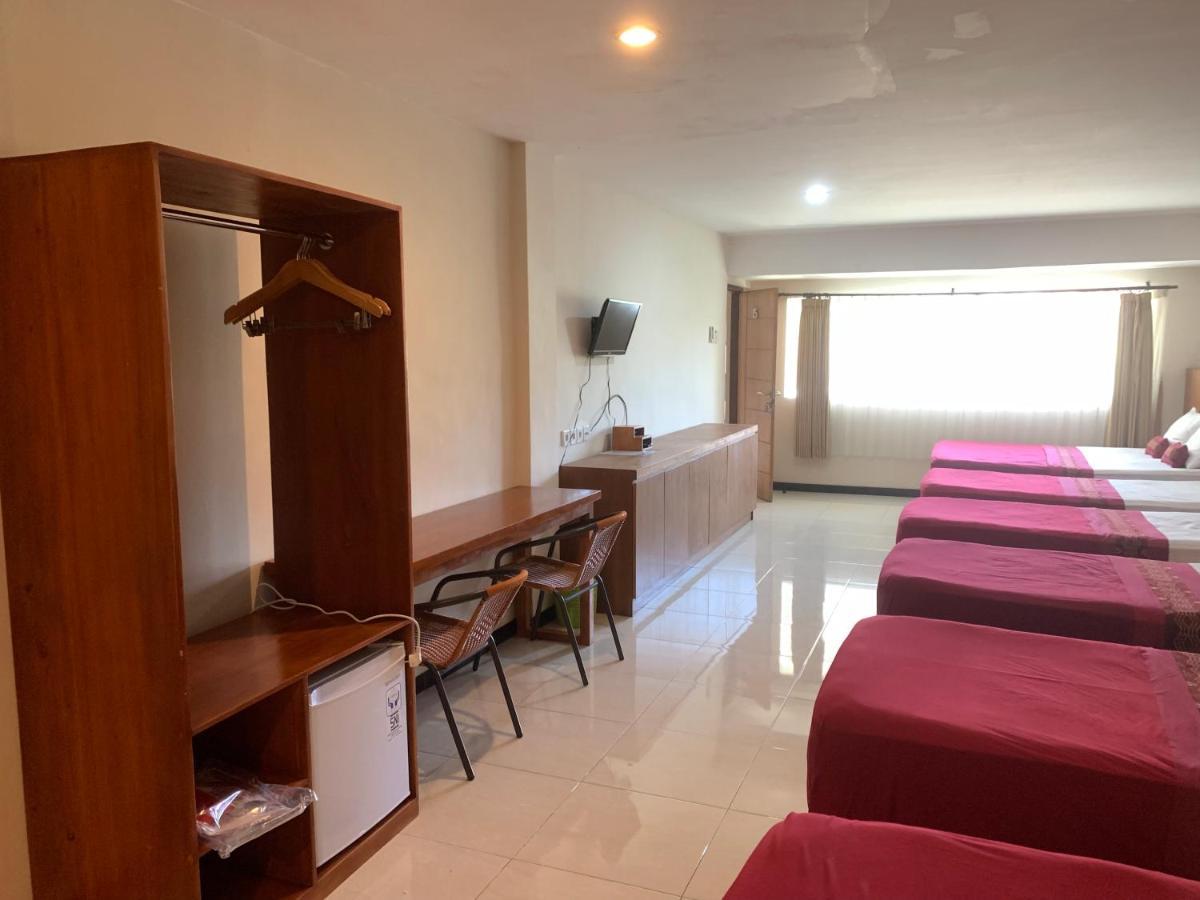 Kuta Suci Guesthouse Εξωτερικό φωτογραφία