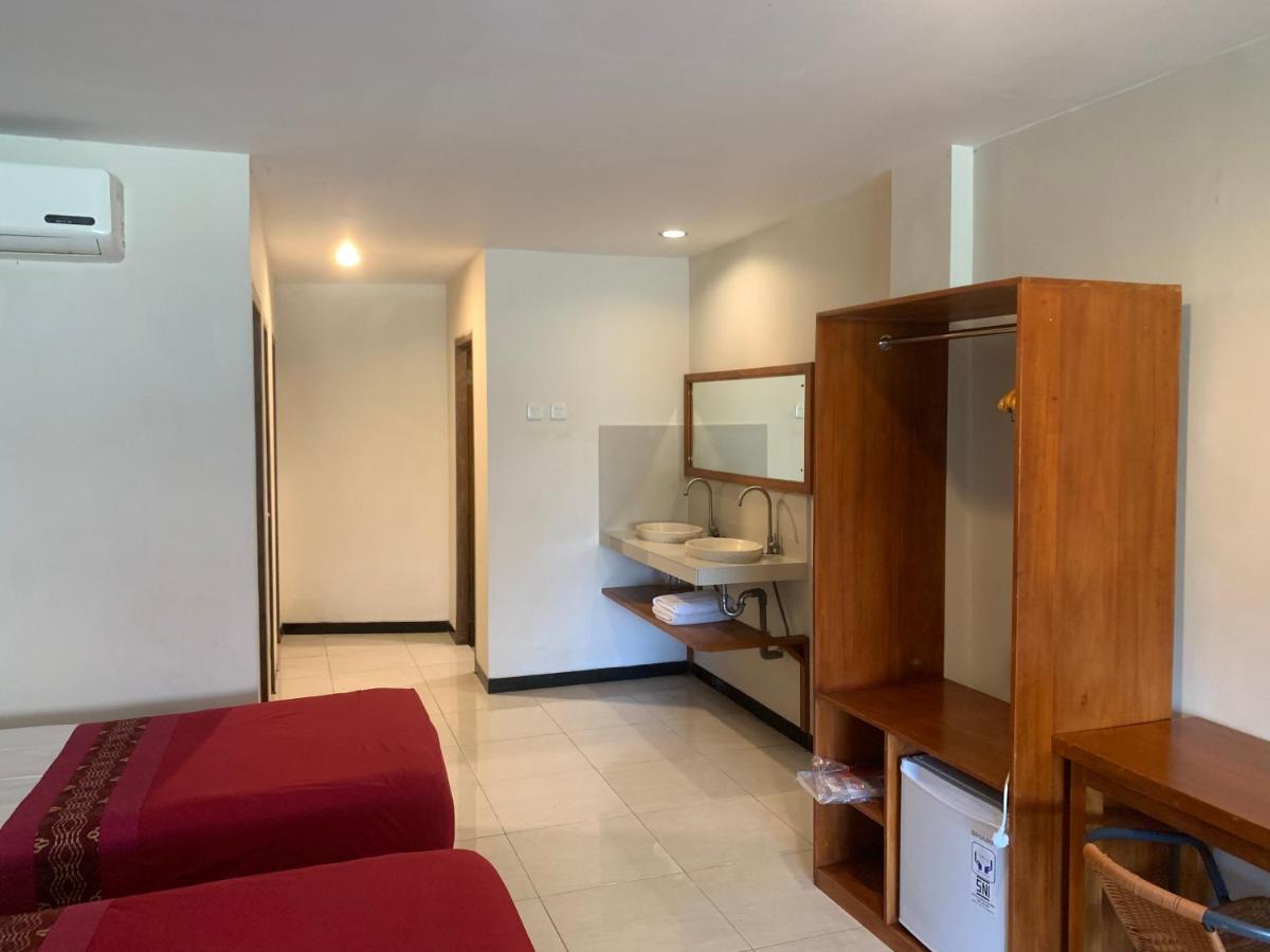 Kuta Suci Guesthouse Εξωτερικό φωτογραφία