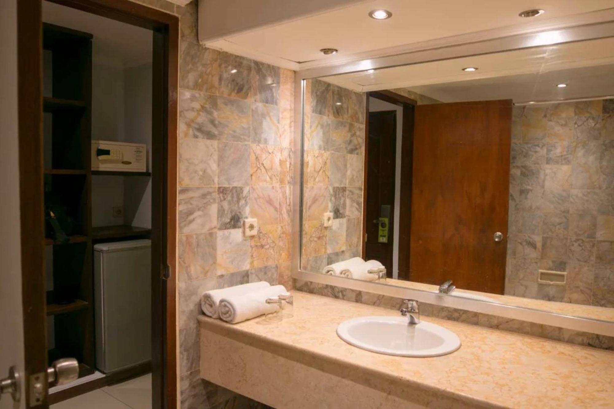 Kuta Suci Guesthouse Εξωτερικό φωτογραφία