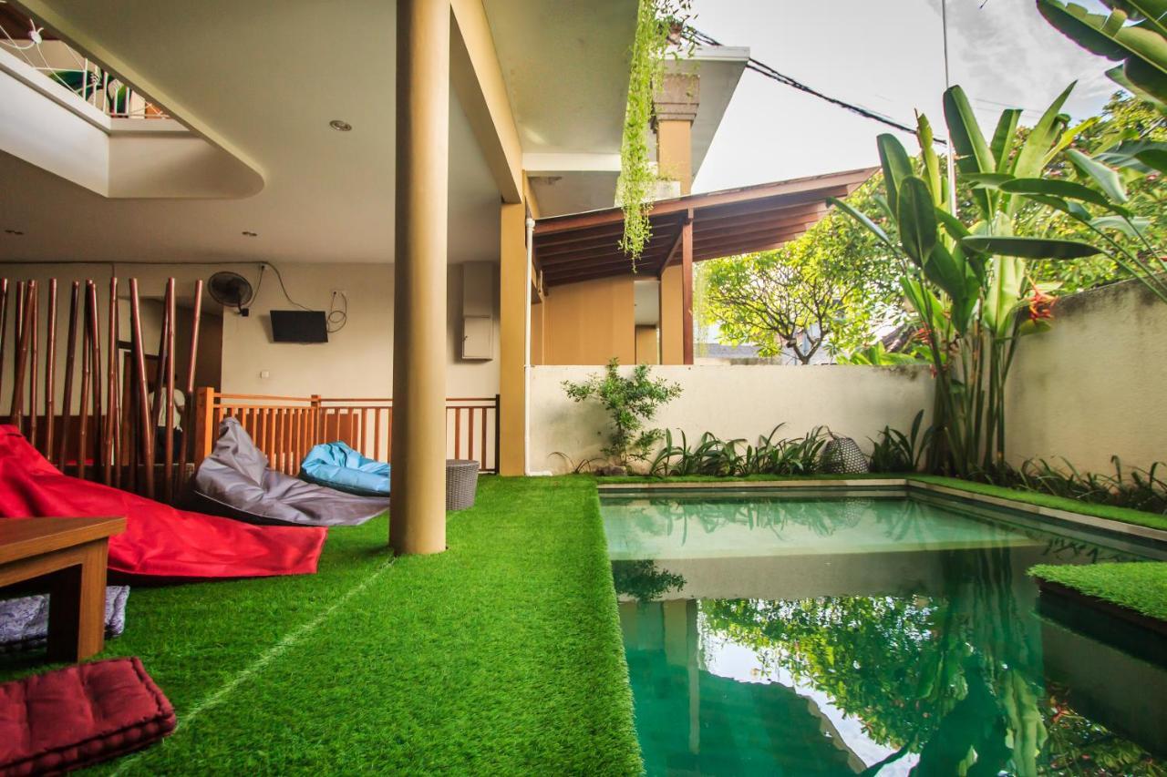 Kuta Suci Guesthouse Εξωτερικό φωτογραφία
